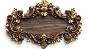 An ornate wooden frame with gold leafs and flowers photo