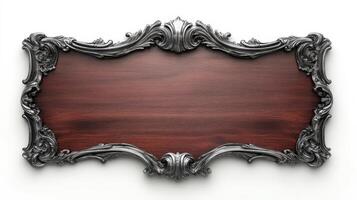 An ornate wooden frame with a silver border photo