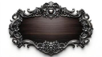 An ornate wooden frame with a silver border photo