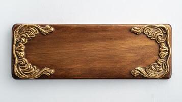 A wooden plaque with gold decorations on it photo