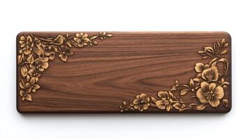 A wooden cutting board with gold flowers photo