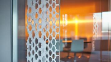 A glass wall with a pattern of hexagons photo