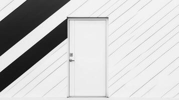 A white door is in front of a black and white striped wall photo