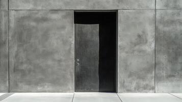 A door is open on a concrete wall photo