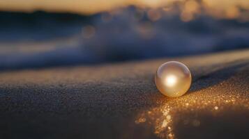 A pearl on the beach at sunset photo