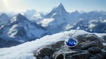 A blue stone pendant sitting on top of a mountain photo