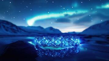 An aurora borealis in the sky above a mountain photo
