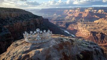 A diamond tiara sits on top of a rock overlooking the grand canyon photo