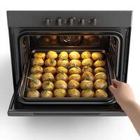 A person taking potatoes out of an oven photo