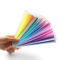 Hand holding a color swatch on white background photo
