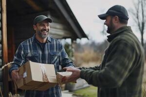 Happy man receiving packages at his log cabin home photo