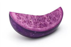 A vibrant purple eggplant slice shows its seeds and texture photo
