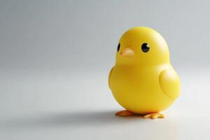 A Cute Yellow Chick Stands on a Plain White Background photo