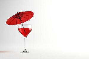 Red cocktail drink with a small red umbrella photo