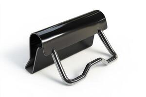 Black metal clip with chrome handle detail photo