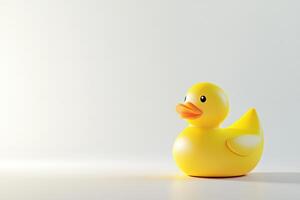 A Yellow Rubber Duck on a White Background photo
