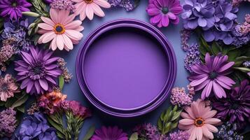 Purple round frame surrounded by purple flowers photo