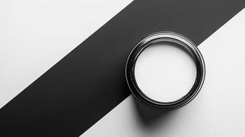 White paint can on black and white background photo