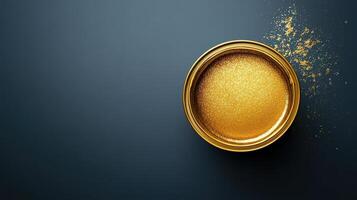 Golden Glitter Paint In A Small Metal Can photo