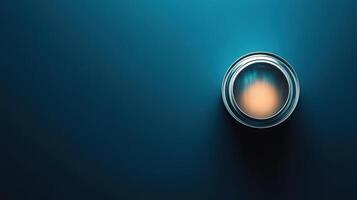A Metal Paint Can on a Dark Blue Background photo
