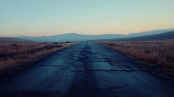 An empty road in the middle of nowhere photo