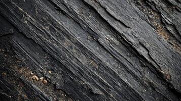 Dark Slate Rock Layers Showing Diagonal Striations photo