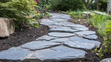 A stone pathway in a garden photo
