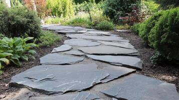 A stone path in a garden with rocks photo