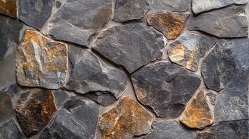 A stone wall with many different colors photo
