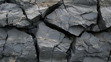 Dark Grey Cracked Rock Formation Texture photo