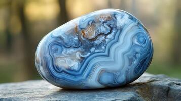 Polished Blue Agate Stone Shows Intricate Banding Patterns photo
