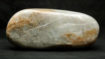 Polished Stone Showing Veins of White and Brown photo