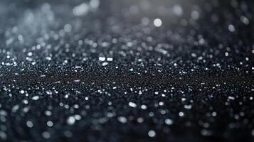 Dark Surface Sparkling With Water Droplets photo
