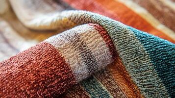 A Soft Textured Striped Fabric Blanket photo
