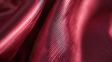 Crimson Fabric Draped in Soft Elegant Folds photo