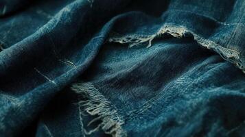 Detailed Close Up Of Frayed Denim Jeans Texture photo