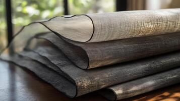 Elegant Fabric Rolls Displaying Textured Weave photo