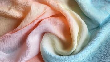 Pastel Ombre Fabric Draped Softly Showing Texture photo