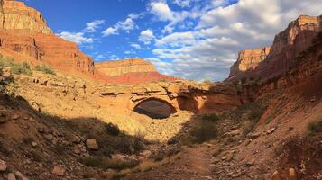 Natural stone arch in a red rock canyon landscape photo