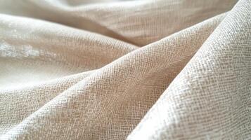 Beige Woven Fabric Draped in Soft Folds photo