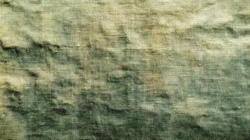 Textured Fabric Background Showing Green And Beige Hues photo