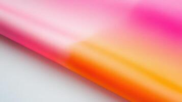 Rolled Gradient Fabric Showing Pink Orange Hues photo