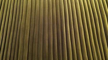 Olive Green Pleated Fabric Texture Background photo