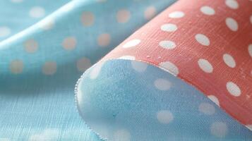 Blue and Coral Polka Dot Fabric Draped Softly photo