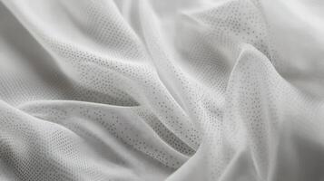 White Fabric Draped with Subtle Dotted Pattern photo