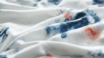 White Fabric Displays Blue And Peach Watercolor Design photo