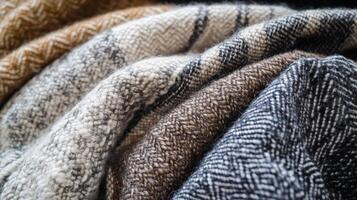 Warm woolen fabrics in assorted colors and patterns photo