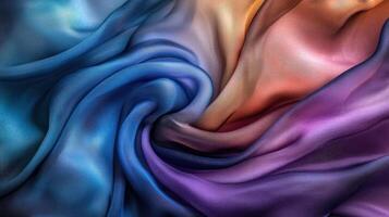 Swirling ombre silk fabric displays vibrant colors photo