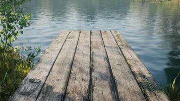 Weathered Wooden Dock Over Calm River Water photo