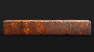 Heavily rusted rectangular metal block on black background photo